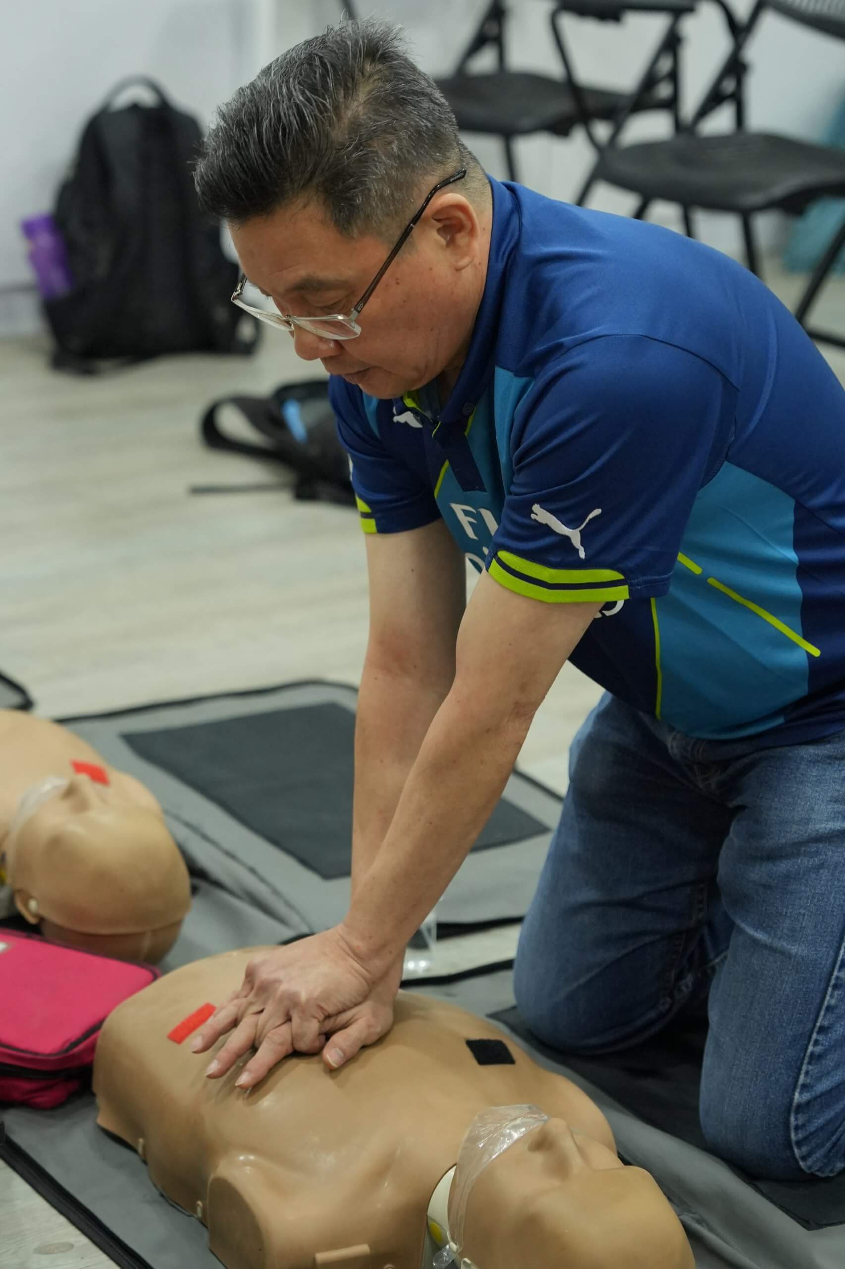 CERT First Aider Doing CPR